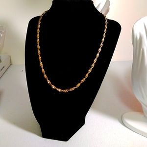 Gold toned twisted chain necklace adjustable